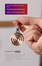 Load image into Gallery viewer, Gyro pendant attached to a keychain for portability