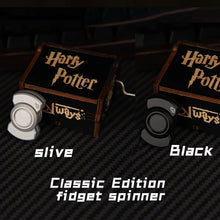 Load image into Gallery viewer, Close-up of magnetic slider transformation: spinning top, smooth sliding plate, and tactile clicker buttons