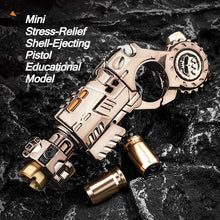 Load image into Gallery viewer, Titanium Steel metal shell ejecting toy pistol stress relief gadget