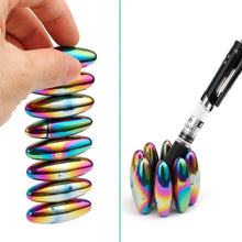 Load image into Gallery viewer, Rolling rainbow oval magnetic fidget balls in hand