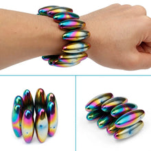 Load image into Gallery viewer, Rainbow oval magnetic beads used as pen holder