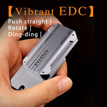 Cargar imagen en el visor de la galería, Hand holding Vibrant EDC direct push focus fidget tool