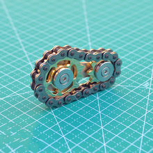 Load image into Gallery viewer, Spinner toy placed on an office desk as a meditation tool