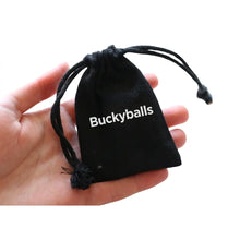 Laden Sie das Bild in den Galerie-Viewer, Black Buckyballs drawstring storage pouch held in hand
